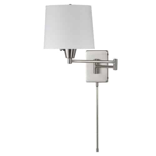 A classic look gets a conveniently modern makeover in the Arm Swing Lamp collection. It's a versatile design with a classic profile, and adjustable placement you can customize. The metal frame comes in a subtle satin chrome finish, contrasting a white fabric shade in your choice of drum or tapered drum shape. It's the perfect way to add spot lighting in areas where floor space is at a premium. With its nod to traditional forms, its sleek modern silhouette adds an element of luxury and style to living rooms, hallways or office suites.