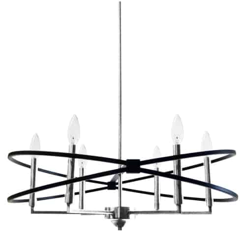 Paloma lighting takes center stage, with its beguiling combination of circular and vertical lines blended with artistic flair. The design evokes traditional motifs and forms, while adding a distinctly space age edge. The unique look is crafted in metal in two contrasting finishes. A simple drop leads to horizontal arms, with the traditional chandelier lights housed vertically. Horizontally, a double circle loops around at an angle. The effect adds a noticeable pop of designer style to living and dining rooms, and sets a distinctive note in your foyer.